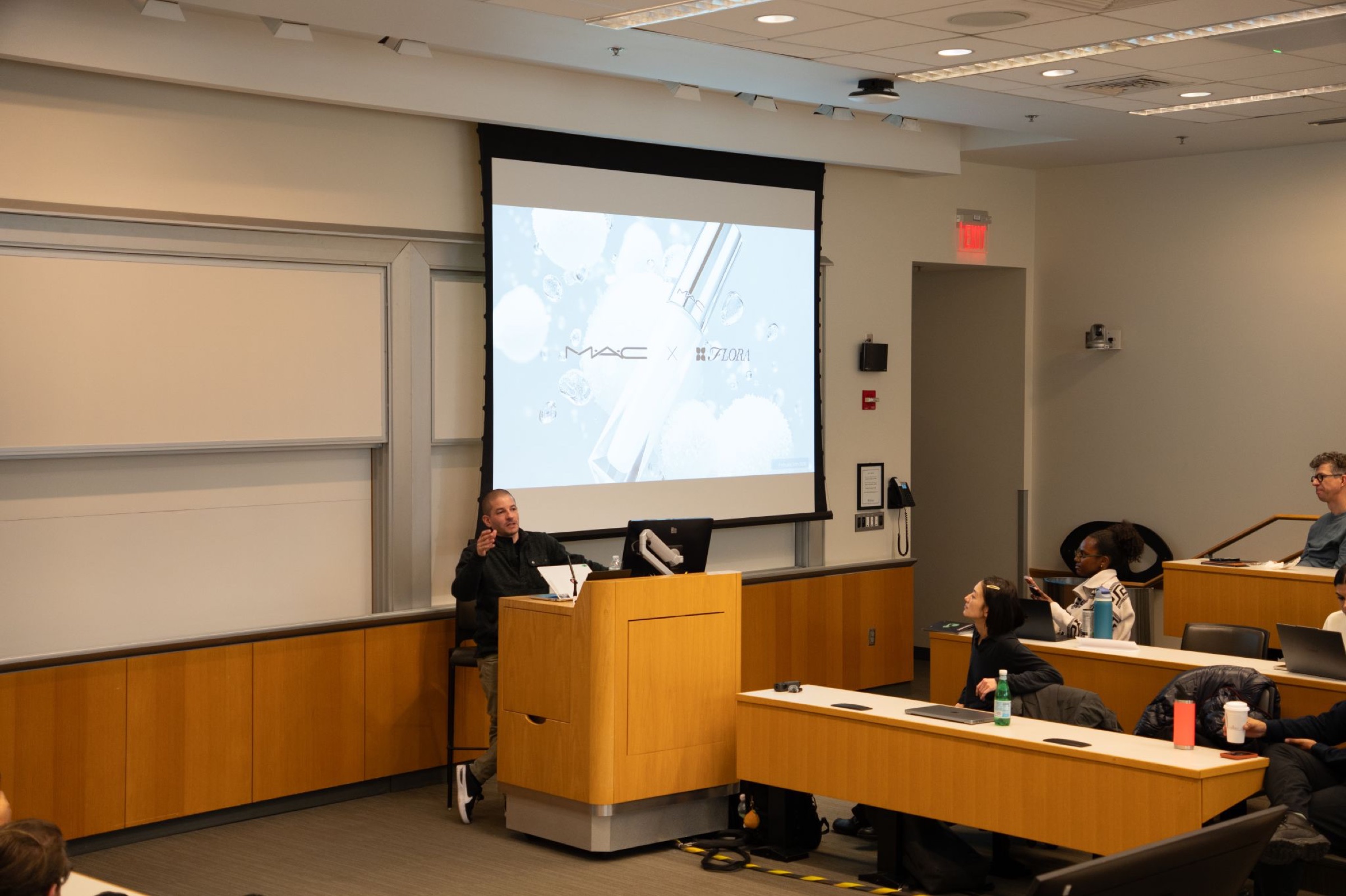 Jeffrey Blum presenting a M·A·C campaign case study to students at Wharton